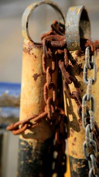 salvador, bahia / brazil - july 4, 2020: rusty chain is seen on the street in the neighborhood of Cabula in the city of Salvador.

