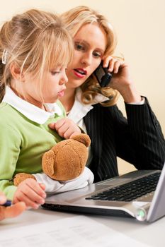 Family Business - telecommuter Businesswoman and mother having trouble to concentrate on her work while the kid is trying to get some attention - metaphor for the lifestyle choices we all face