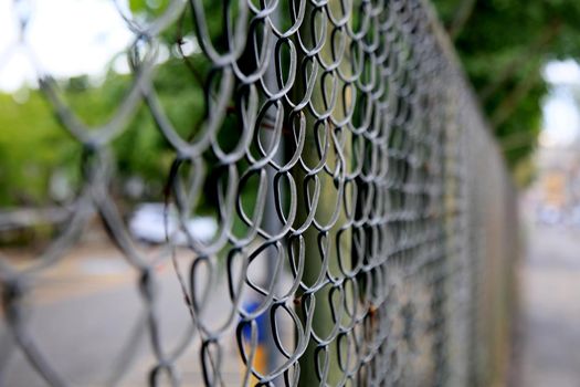 salvador, bahia, brazil january 4, 2021: protective screen made with steel screen is seen on a wall in the city of Salvador.
