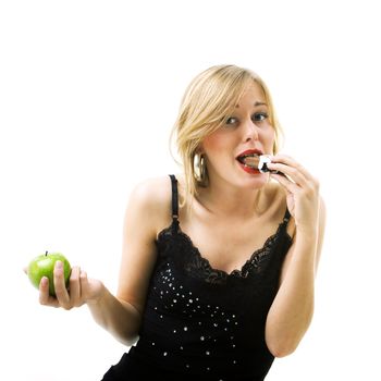Food and healthy nutrition - Woman eating candy instead of apple