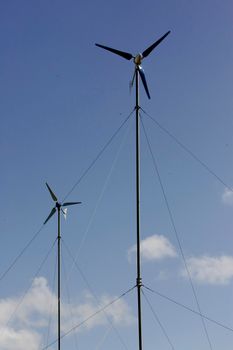 nova vicosa, bahia / brazil - setembro 8, 2009: small wind turbine used in a project to collect electricity for the community of Ilha da Cassumba, in Nova Vicosa.
