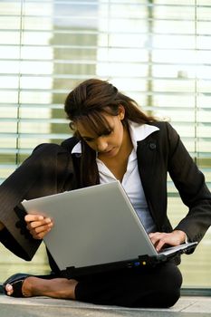 Young woman working in office building