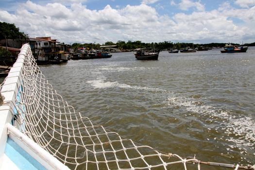 nova vicosa, bahia / brazil - march 2, 2008: Fishing vessels are seen in a port in the city of Nova Vicosa, in southern Bahia.