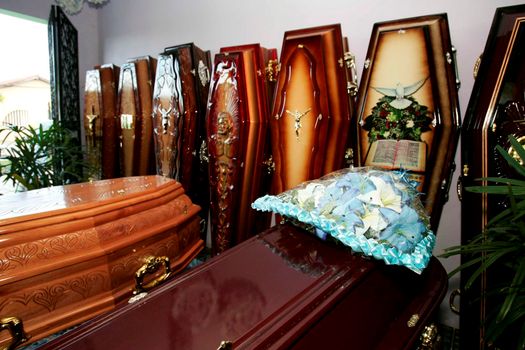 eunapolis, bahia / brazil - march 18, 2009: Funeral urn is seen at Dead Man's Coffin sale store in Eunapolis City.


