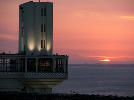 salvador, bahia / brazil - july 3, 2006: lacerda elevator beside the sunset in Baia de Todos os Santos in the city of Salvador.




