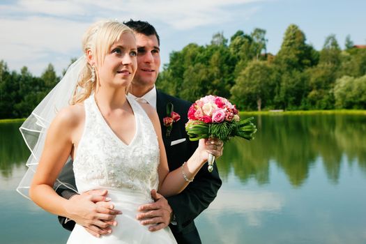 wedding couple looking forward into a bright future