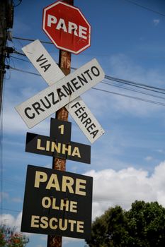 mata de sao joao, bahia / brazil - november 9, 2020: traffic signs indicate crossing of railway lines in the city of Mata de Sao Joao.