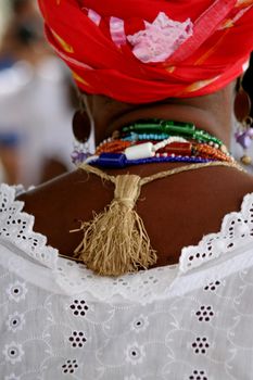 santo amaro, bahia / brazil - may 13, 2007: Candomble supporters are seen during a delivery of offering to spirits of religion, in a religious event known as Bembe do Mercado in the city of Santo Amaro.