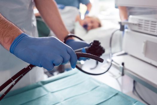 Internist doctors during stomach examination working as a team