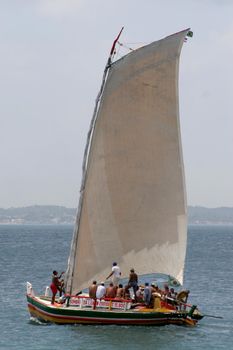 salvador, bahia / brazil - january 21, 2007: Saveiros are seen during Regatta Joao das Batas in Baia de Todos os Santos in the city of Salvador.


