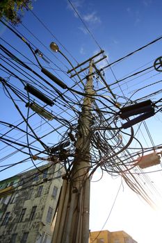 salvador, bahia / brazil - february 16, 2016: pole with excess wiring is seen in the Nazare neighborhood in the city of Salvador.


