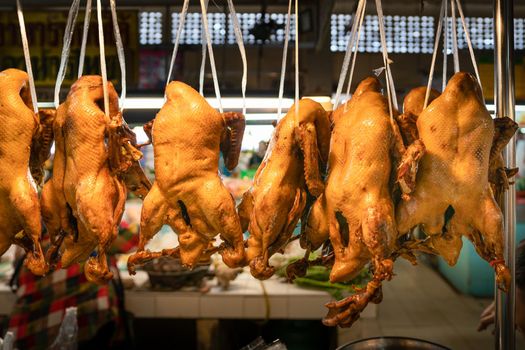 Chinese New Year's Eve : duckling or pot-stewed duck and boiled chicken on sales at market for chinese new year festival.