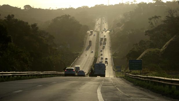 camacari, bahia / brazil - december 15, 2016: vehicles are seen passing on the BA 512 highway, in the municipality of Camacari.


