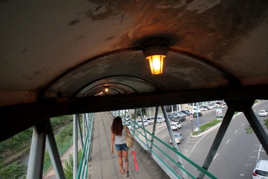 salvador, bahia / brazil - april 20, 2017: light on is seen on a walkway on Avenida Tancredo Neves in the city of Salvador.