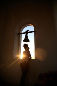 madre de desus, bahia / brazil - october 21, 2017: people are seen jutos the church bell in the city of Madre de Deus.