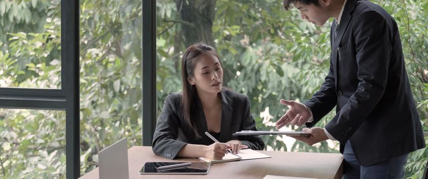 Close up Group of business people busy discussing financial matter during meeting. Corporate Organization Meeting Concept.