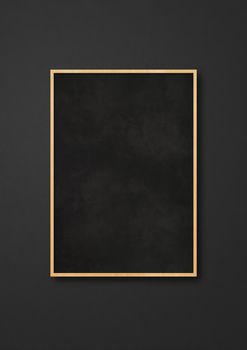 Traditional blackboard isolated on a black background. Blank vertical mockup template