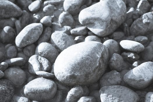 Set of natural stones on the bank of a river. No people