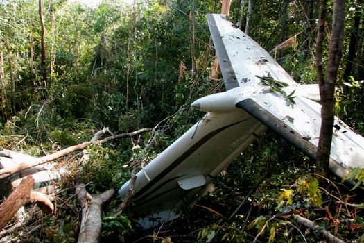 porto seguro, bahia / brazil - may 25, 2009: wreckage of a Super King Air B-350 model plane crashing at Terravista Airport in the Trancoso district of Porto Seguro.