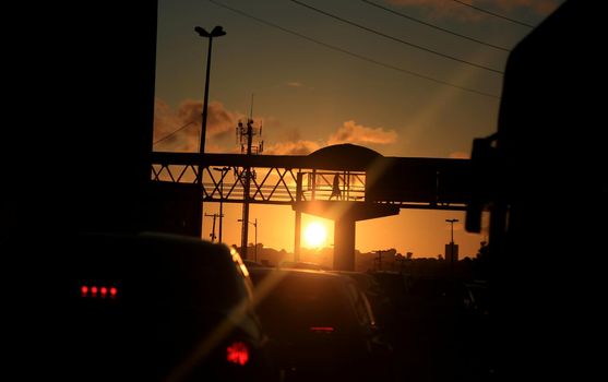 salvador, bahia / brazil - march 27, 2017: sunset next to the pedestrian walkway on Avenida Tancredo Neves in the city of Salvador.




