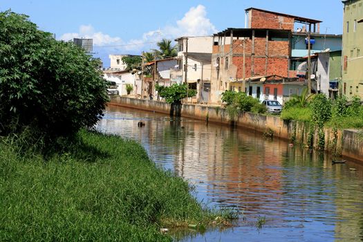 salvador, bahia / brazil  - april 24, 2014: View of the Camurugi River. The river receives domestic and industrial sewage from the city of Salvador.