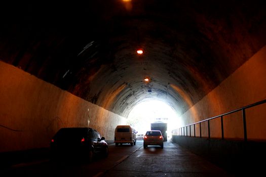 salvador, bahia / brazil - september 5, 2014: vehicles are seen at the exit of the Teodoro Sampaio tunnel in the city of Salvador.