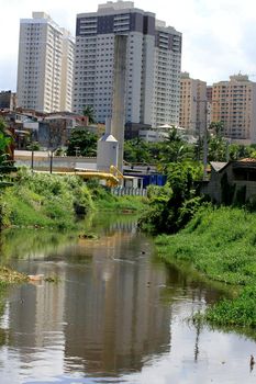 salvador, bahia / brazil  - april 24, 2014: View of the Camurugi River. The river receives domestic and industrial sewage from the city of Salvador.