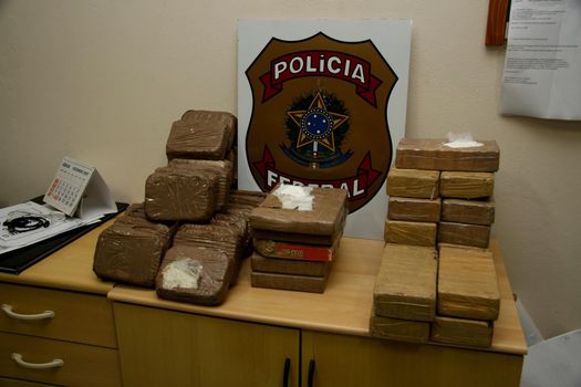 porto seguro, bahia / brazil - may 21, 2008: Seizure of cocaine by the Federal Police at the airport in the city of Porto Seguro, in the south of Bahia.