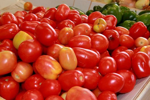 conde, bahia / brazil - september 17, 2012: tomatoes are seen for sale at an open market in the city of Conde.