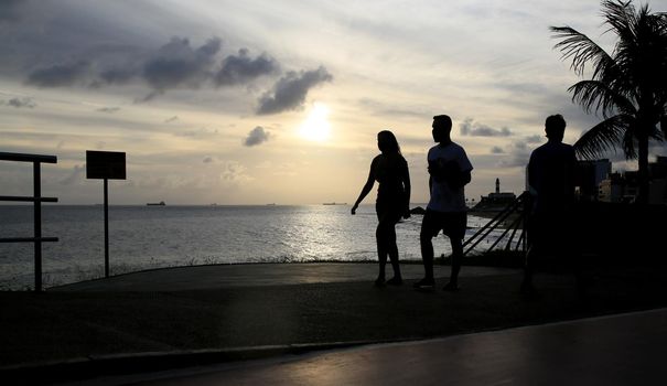 salvador, bahia, brazil - january 22, 2021: farm person walking during physical activity in Barra neighborhood in the city of Salvador.