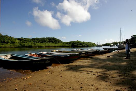 porto Seguro, Bahia / Brazil - February 26, 2011: boats are seen in the waters of the Caraiva River in the Caraiva district in the municipality of Porto Seguro.