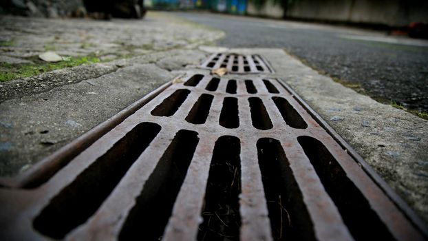 salvador, bahia / brazil - june 27, 2020: manhole grating for rainwater drainage is seen in a condominium in the city of Salvador.