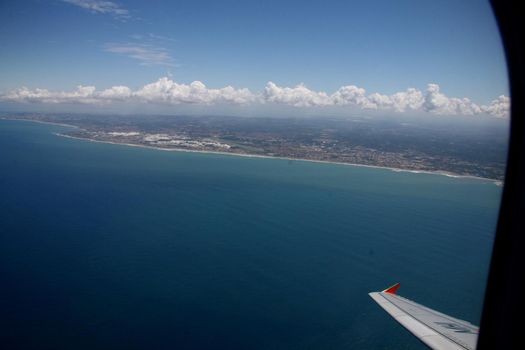 salvador, bahia / brazil - april 24, 2008: view from an airplane window during flight in the city of Salvador.