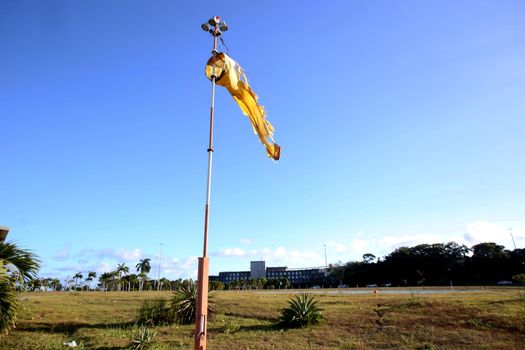 salvador, bahia / brazil - february 26, 2018: watered windsock is seen on the helipad at the Bahia Administrative Center in the city of Salvador.





