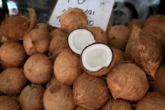 salvador, bahia, brazil - january 27, 2021: broken dry coconut is seen for sale at the fair in japan, in the Liberdade neighborhood in the city of Salvador.