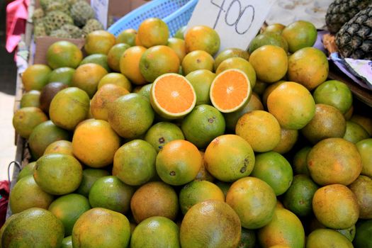 salvador, bahia, brazil - january 27, 2021: orange fruits are seen for sale at the fair in japan, in the Liberdade neighborhood in the city of Salvador.
