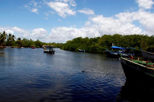 conde bahia / brazil - march 28, 2013: fishing vessels are seen on the Itapicuru River in the city of Conde.



