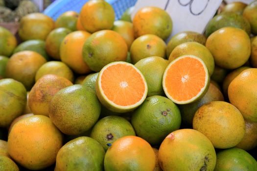 salvador, bahia, brazil - january 27, 2021: orange fruits are seen for sale at the fair in japan, in the Liberdade neighborhood in the city of Salvador.
