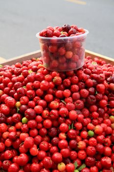 salvador, bahia, brazil - january 27, 2021: acerola fruit for sale at the fair in japan, in the Liberdade neighborhood in the city of Salvador.