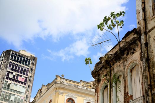 salvador, bahia, brazil - december 28, 2020: old buildings belonging to the historical and architectural heritage are seen abandoned in the neighborhood of Comercio in the city of Salvador.