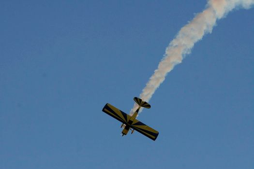 porto seguro, bahia / brazil - october 25, 2008: Small aircraft is seen during maneuvers at an air show with experimental aircraft in the city of Porto Seguro.

 