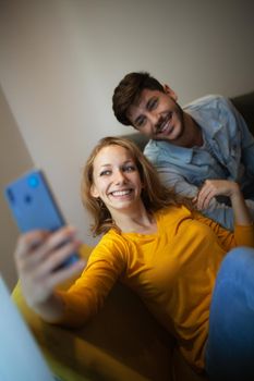couple in love taking selfie and smiling
