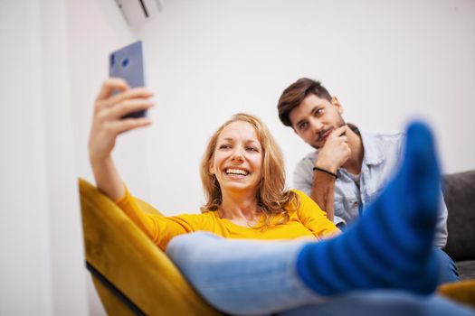 couple in love taking selfie and smiling