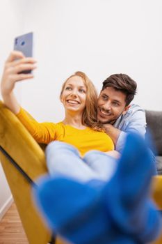 couple in love taking selfie and smiling