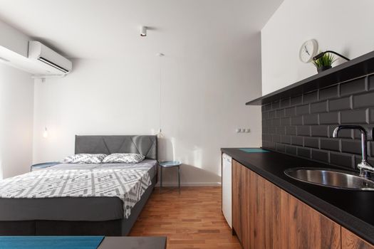 kitchen and bed in a modern apartment