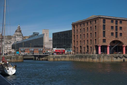 LIVERPOOL, ENGLAND, UK - JUNE 07, 2017: View of Albert Dock in Liverpool, England. The Albert Dock is a complex of dock buildings and warehouses. First non-combustible warehouse system in the world.