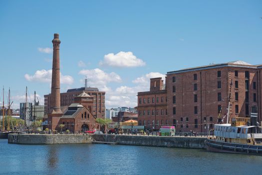 LIVERPOOL, ENGLAND, UK - JUNE 07, 2017: View of Albert Dock in Liverpool, England. The Albert Dock is a complex of dock buildings and warehouses. First non-combustible warehouse system in the world.