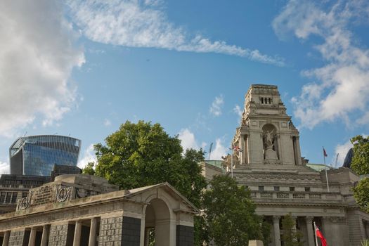 LONDON, UK - SEPTEMBER 08, 2017: View of architecture of the city of London in UK alongside the riverbank of River Thames.