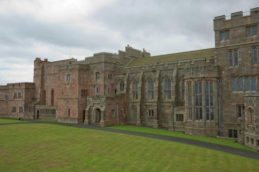 BAMBURGH, NORTHUMBERLAND, ENGLAND, UK - SEPTEMBER 10, 2017: View of Bamburgh Castle in Northumberland, England, UK.