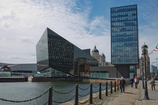 LIVERPOOL, ENGLAND, UK - JUNE 07, 2017: Modern building of Museum of Liverpool and Open Eye Gallery in Liverpool in UK viewed from Canning Dock